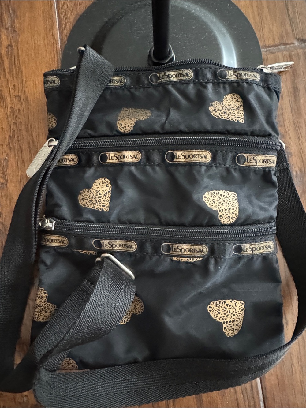 LeSportsac Black Crossbody with Gold Heart Accents